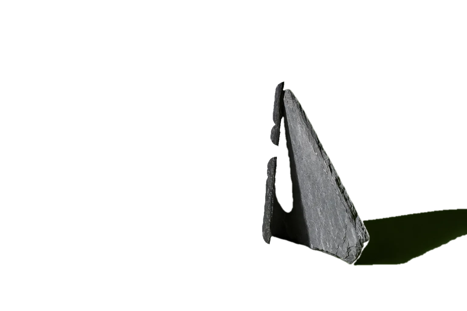 A slab of slate on a moss green studio backdrop